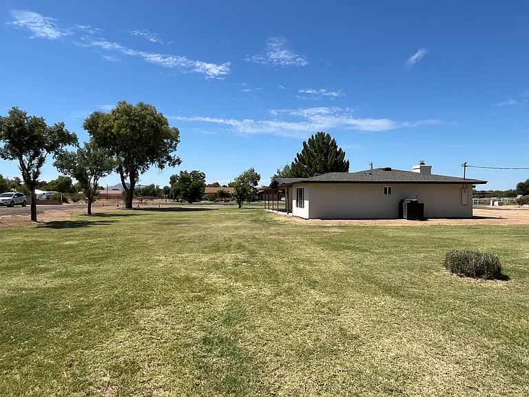 Side yard view. Nearly 1.25 acres of Gilbert land