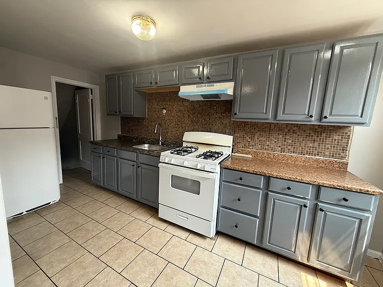 7013 Rutland St — Photo 19