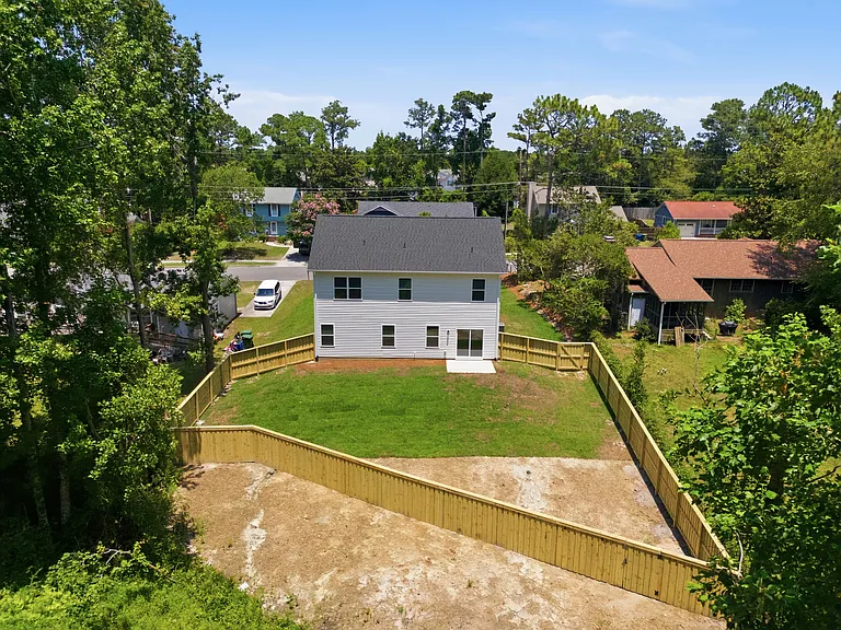 Sky View of Fully Fenced Backyard (Grass is planted and growing in back corner)