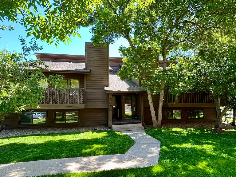 Front entrance - grass and trees.