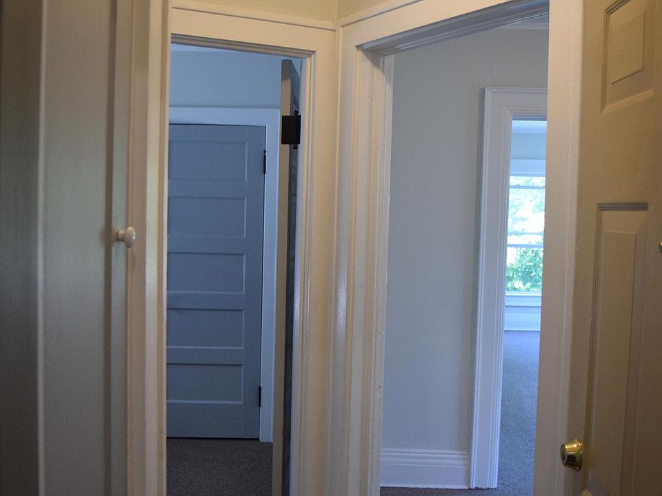 Entryway - convenient storage cabinets/drawers and coat closet