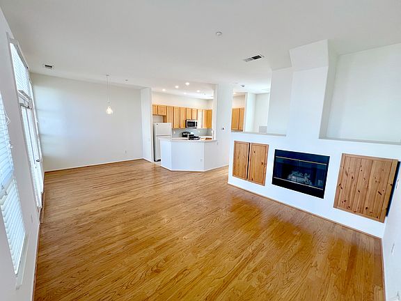 Main living area with gas fireplace and extra storage