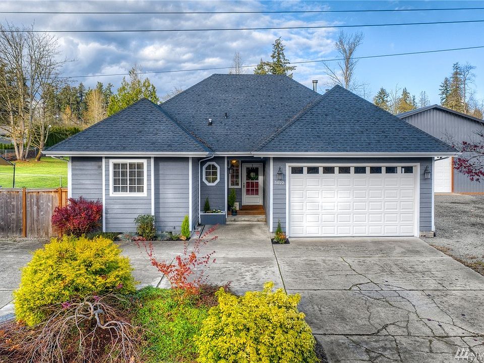 Want the good life??? Beautiful rambler with large shop on 1.67 acres located near freeways and amenities.