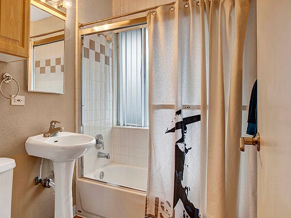 Bathroom with Tile Surround and Extra Storage