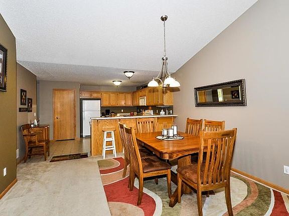 Designated dining area with room to celebrate with family and friends. Notice the size of the dining set here!
