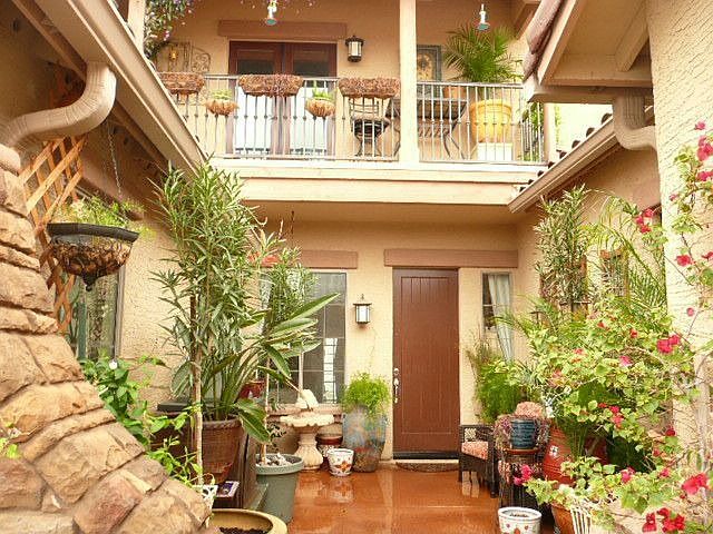 Courtyard w/Private Entry featuring Double French Doors into Guest Bedroom