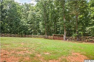 Huge backyard with fire pit