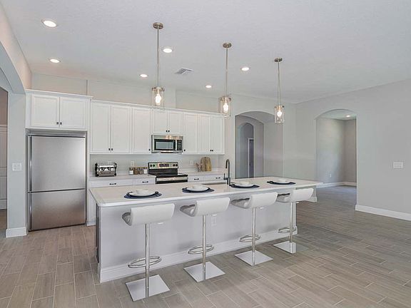 Sapphire new construction home plan open concept kitchen by William Ryan Homes Tampa