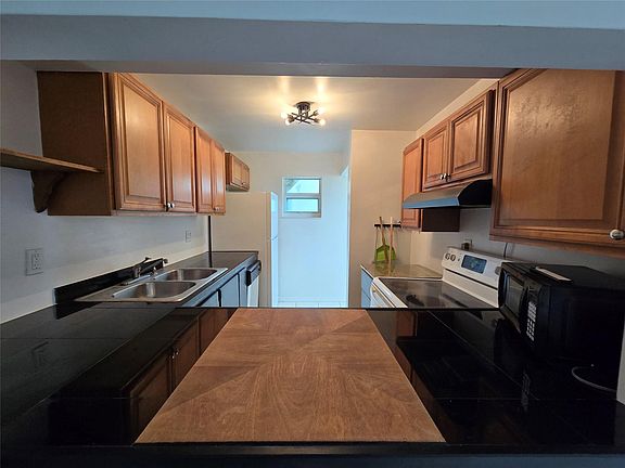 2nd image of 9431 Live Oak Place #109