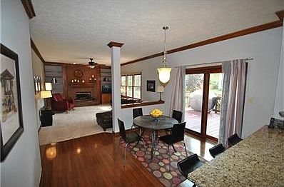 This home has great natural light and a nice layout. The deck is accessed through the sliding glass doors.