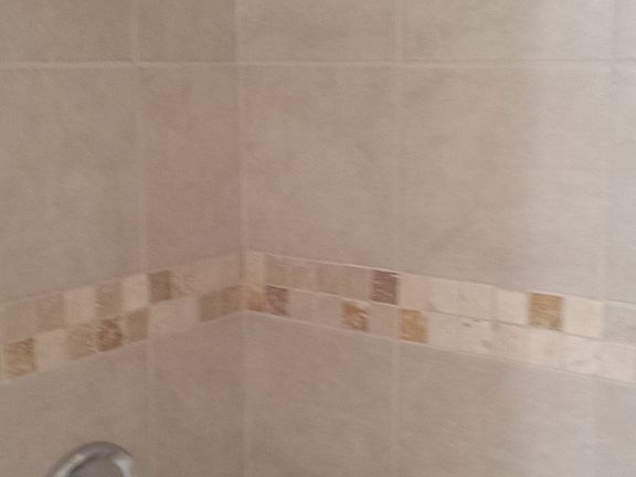 new tile and fixtures in baths
