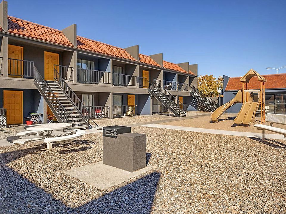 Outdoor Playground and Relaxing Sitting Area | Las Brisas Apartments