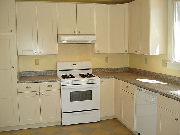 New floors, applicances, cabinets, and countertops