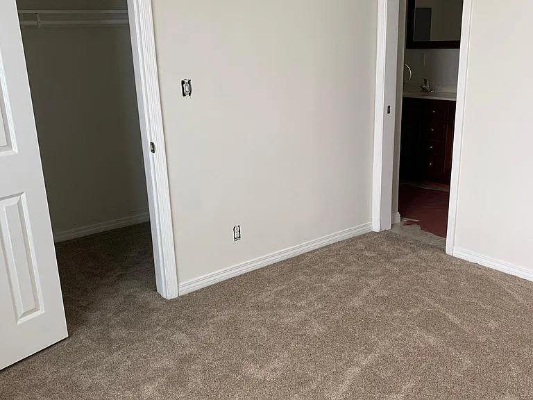 bedroom #1 (12x12) toward walk in closet & jack / jill bathroom