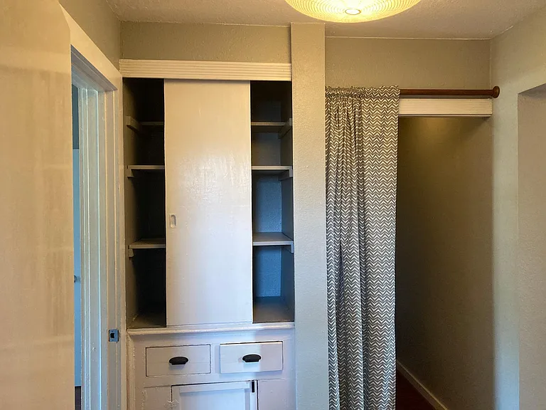 Hallway Walk In Closet and Cabinet Space