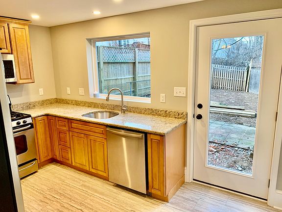 Brand new kitchen; solid wood cabinets, granite countertops, stainless steel appliances and oversized picture window; new deck and landscaping to come in Spring '20