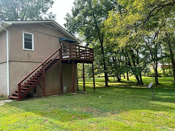 Back deck leads in to the kitchen.