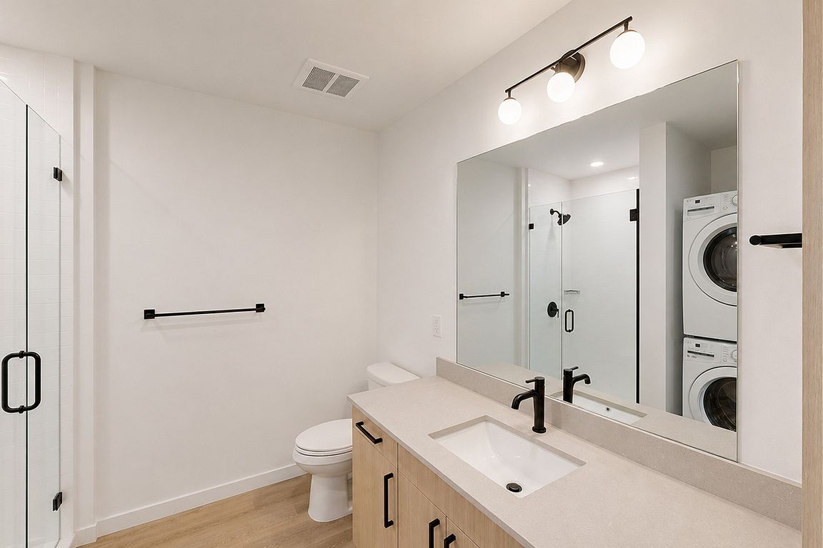 Bright bathroom with modern fixtures and sleek finishes.