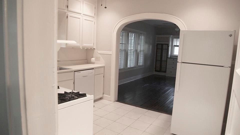 Kitchen looking into living room