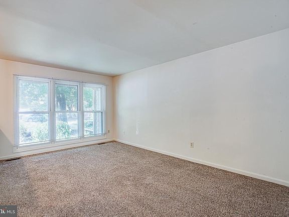 There is plenty of sunlight in the living room.
