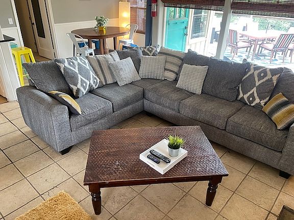 Open living area offers tons of natural light and views of the lake.