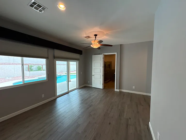 Main bedroom slider & main bath entrance