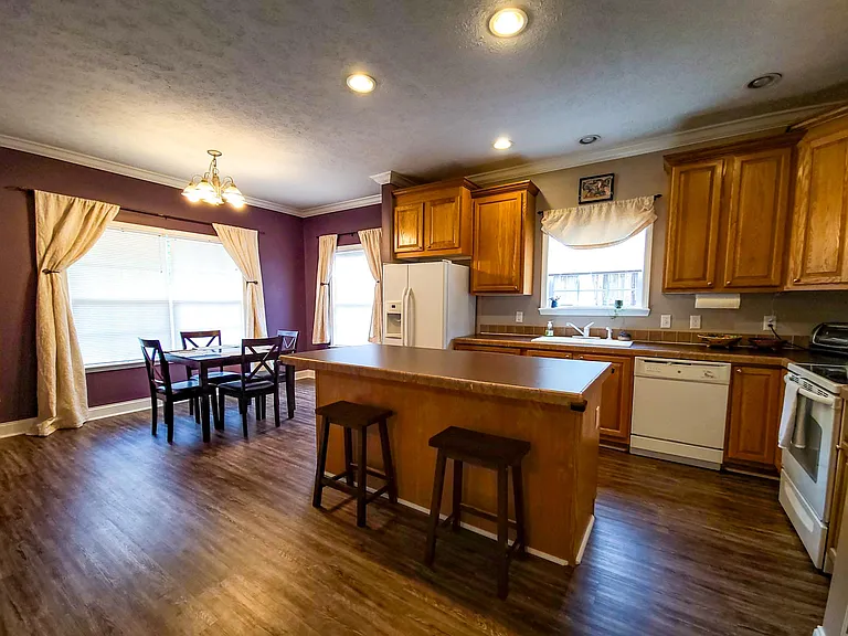 Open floor plan with a large kitchen