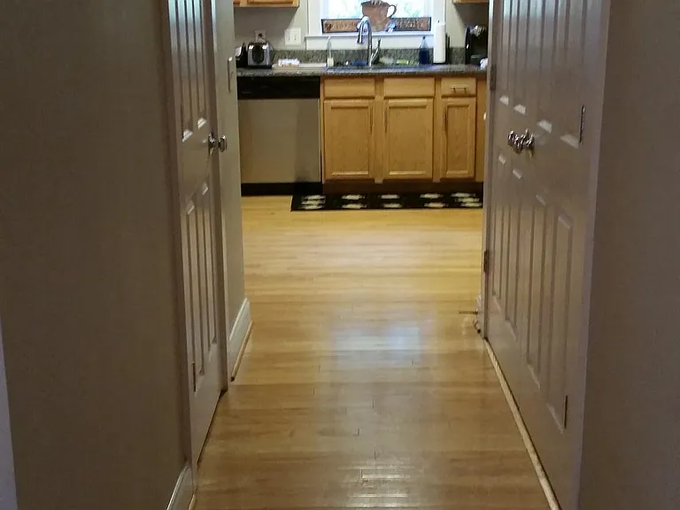 A peak into kitchen from hall.