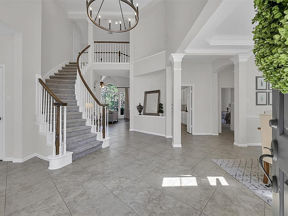 The wide open foyer is welcoming and full of light.