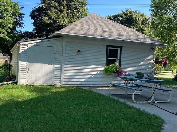 2 Car detached garage. View from the back of the garage with attached storage/garden shed.