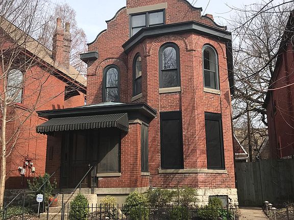Rare gargoyle on the top of the house. Gargoyles are