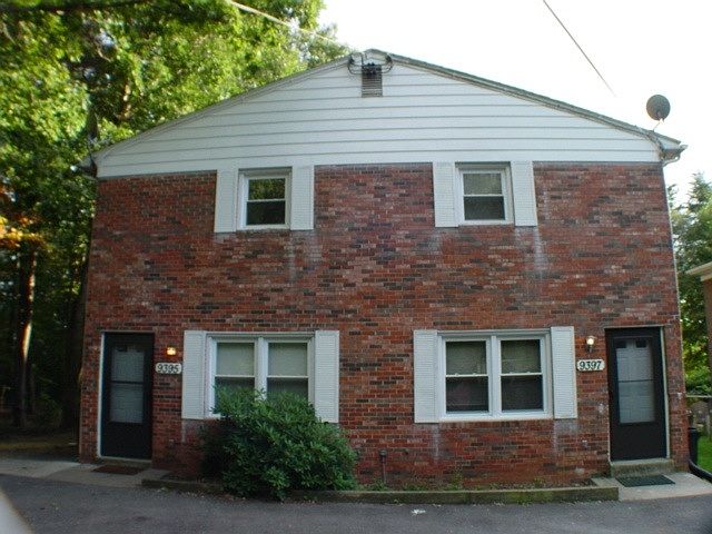 Brick front duplex, with parking for 2 or more large vehicle