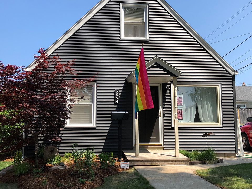 Front of house with new siding