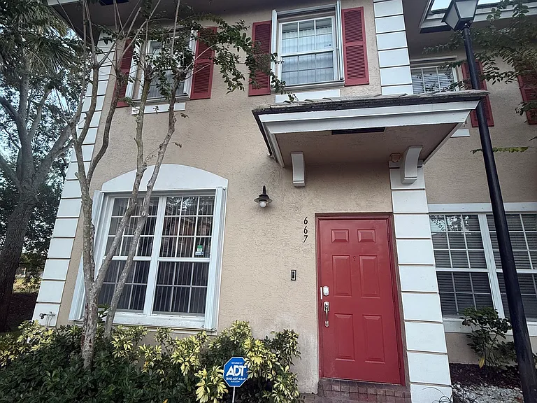 667 NW 42nd Ave — Photo 1