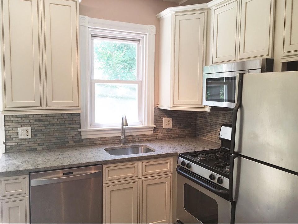 Brand new kitchen with tons of storage and quartz countertop