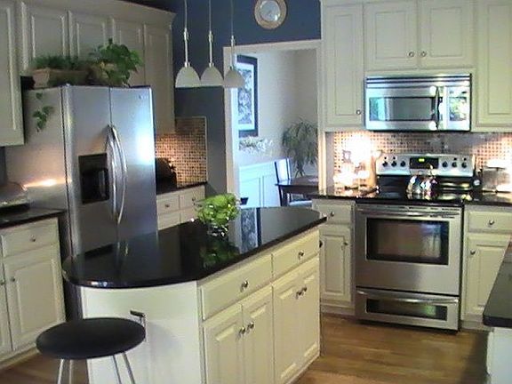 updated kitchen with granite countertops
