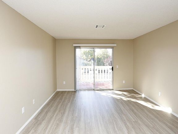 LIVING ROOM WITH LUXURY PLANK FLOORS