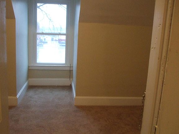3rd floor back bedroom.