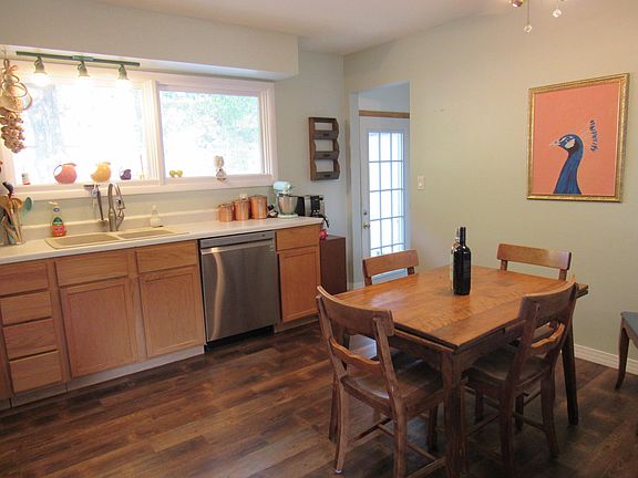 Kitchen has upgraded dishwasher, all appliances stay as well as dining table.