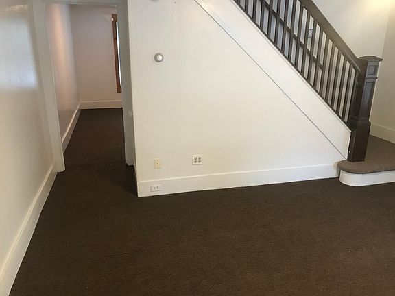 living room with view to dining area