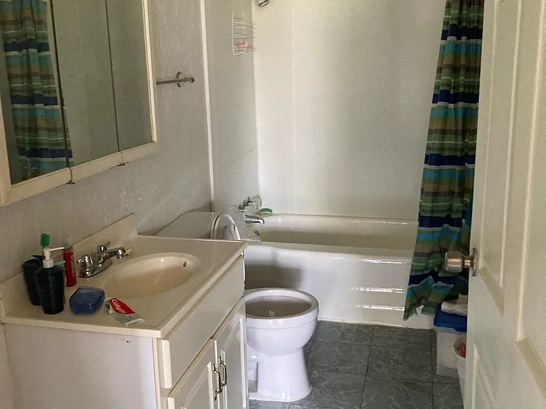 one bathroom, toilet and sink