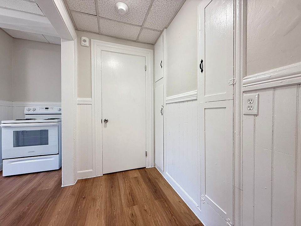 Hallway w/ Closet & Built-ins
