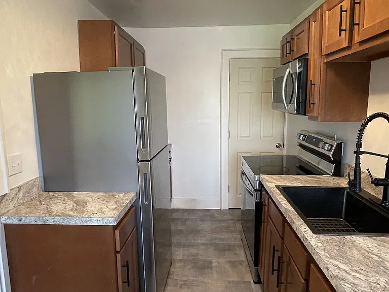 7442 Irvine St — Photo 5