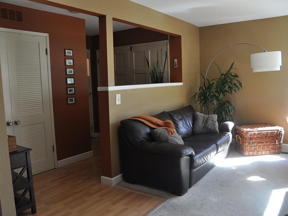 View of front door fro inside and front door closet.