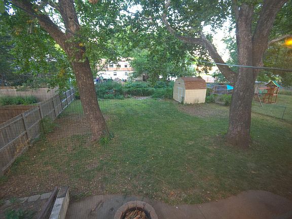 View from upstairs looking out at the backyard. Plenty of space for all your activities.