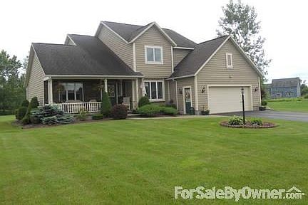Front View
						:
						Home features large front yard.