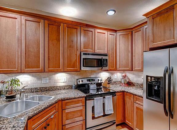 Granite countertops, stainless steel appliances