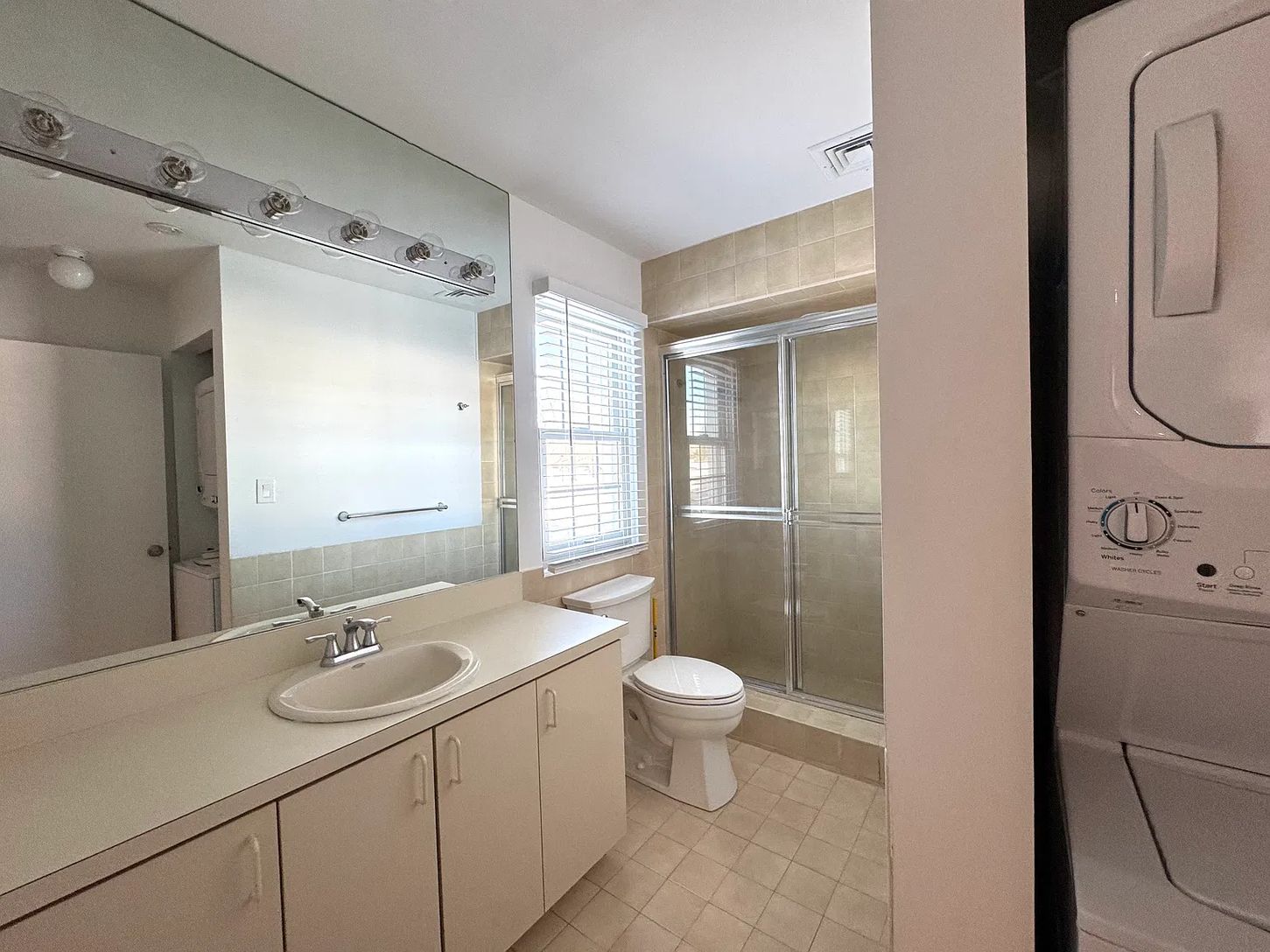  Primary bathroom with washer and dryer