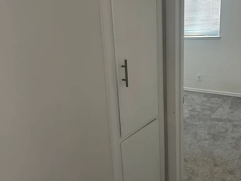 Built-in Linen cabinets, in the hallway. Nice storage space!