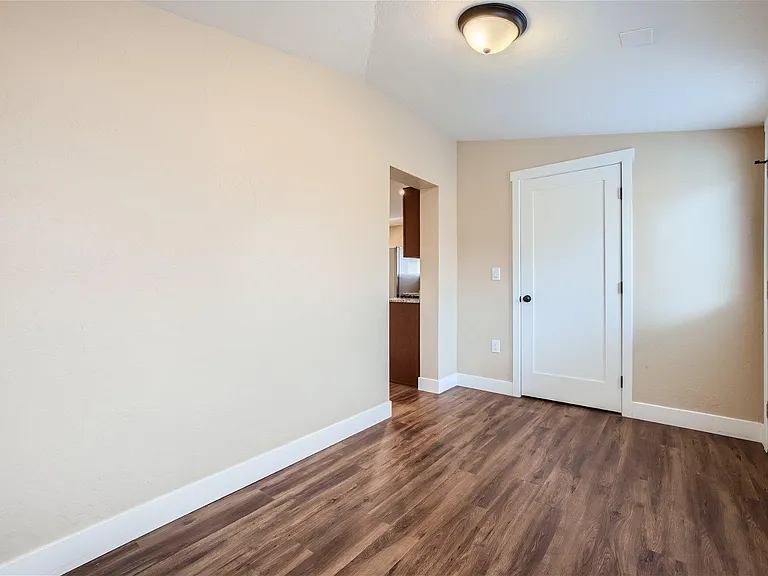 Mudroom/Multifunction Space; Door leading to laundry room